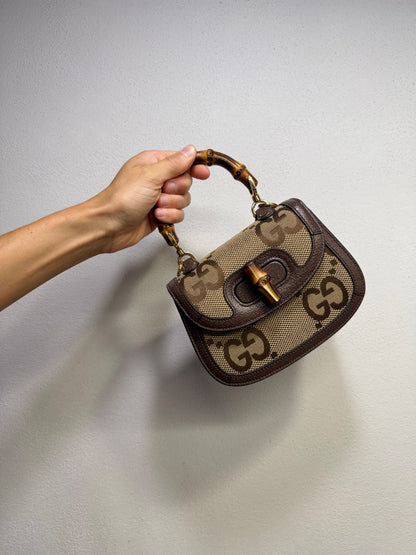 Borsa Borse Vintage Gucci Bamboo in tela GG beige e pelle marrone con iconico manico e chiusura in bambù