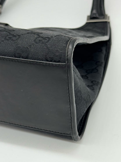 Borsa a spalla Borse Vintage Gucci Jackie in tessuto nero con motivo GG e dettagli in pelle