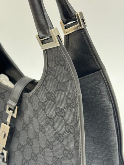 Borsa a spalla Borse Vintage Gucci Jackie in tessuto nero con motivo GG e dettagli in pelle nera