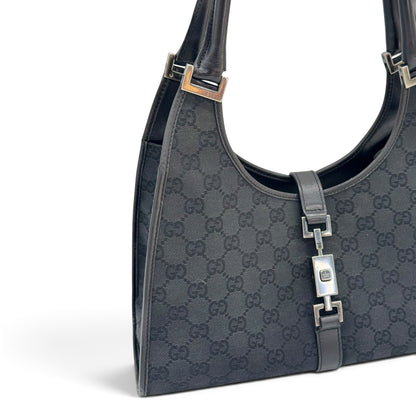 Borsa a spalla Borse Vintage Gucci Jackie in tessuto nero con motivo GG e dettagli in pelle nera
