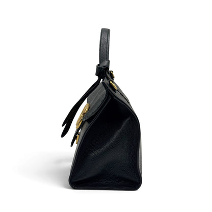 Borsa a mano Borse Vintage Gucci Marmont in pelle nera granulata con logo GG dorato e manico rigido, vista laterale