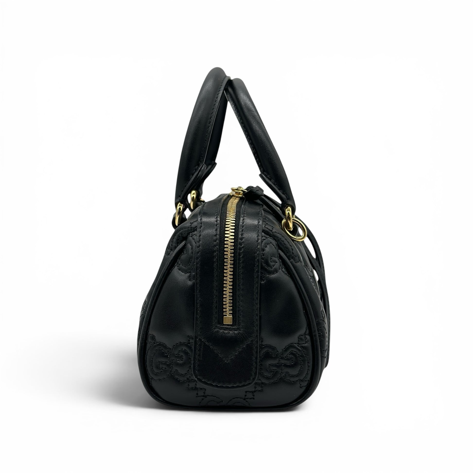 Borsa a mano Borse Vintage Gucci GG Matelassé in pelle nera con dettagli in metallo dorato, vista laterale