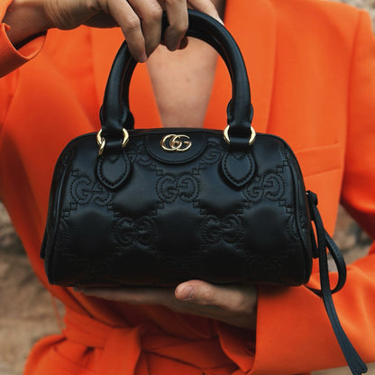 Borsa a mano Borse Vintage Gucci GG Matelassé in pelle nera con logo dorato e lavorazione trapuntata