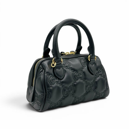 Borsa a mano Borse Vintage Gucci GG Matelassé in pelle nera con motivo trapuntato e dettagli in metallo dorato