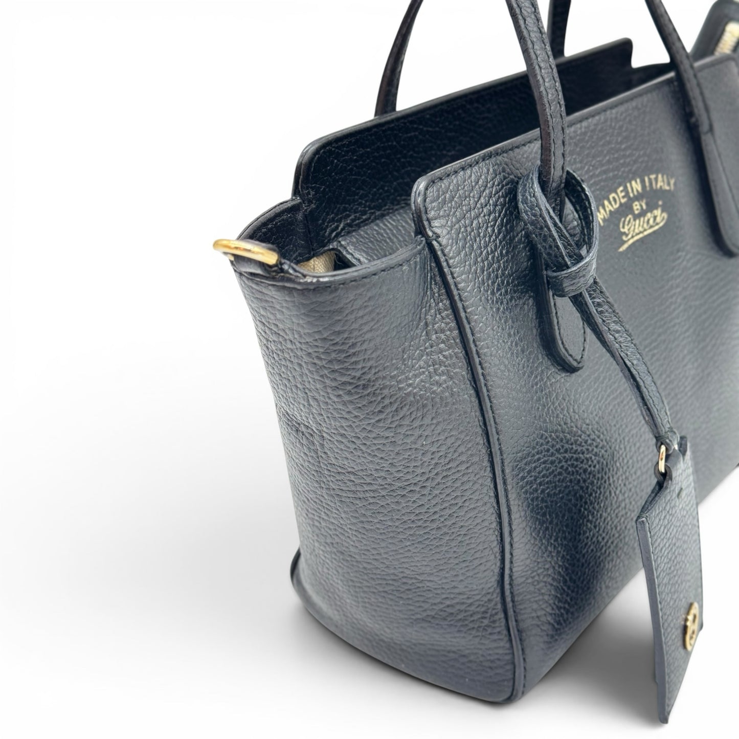 Borsa a mano Borse Vintage Gucci in pelle nera martellata con dettagli in metallo dorato e logo inciso