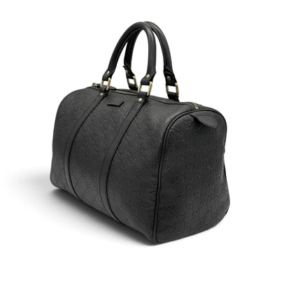Borsa a mano Borse Vintage Gucci in pelle nera con logo GG impresso, design Boston strutturato e dettagli dorati.