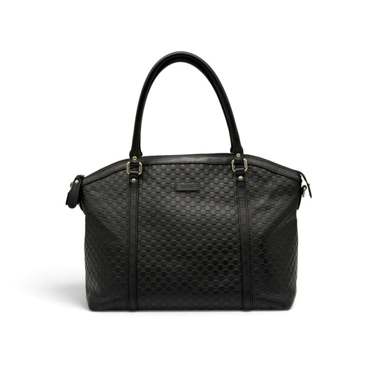 Borsa a spalla Borse Vintage Gucci in pelle nera con motivo GG impresso e dettagli in metallo dorato