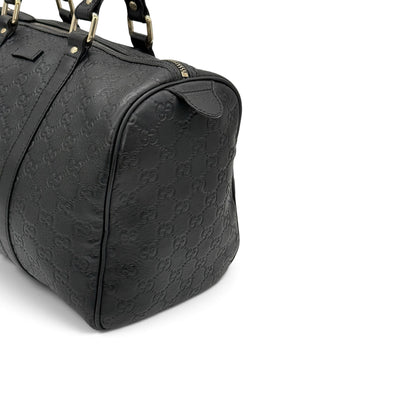 Borsa a mano Borse Vintage Gucci in pelle nera con motivo GG impresso e dettagli in metallo dorato