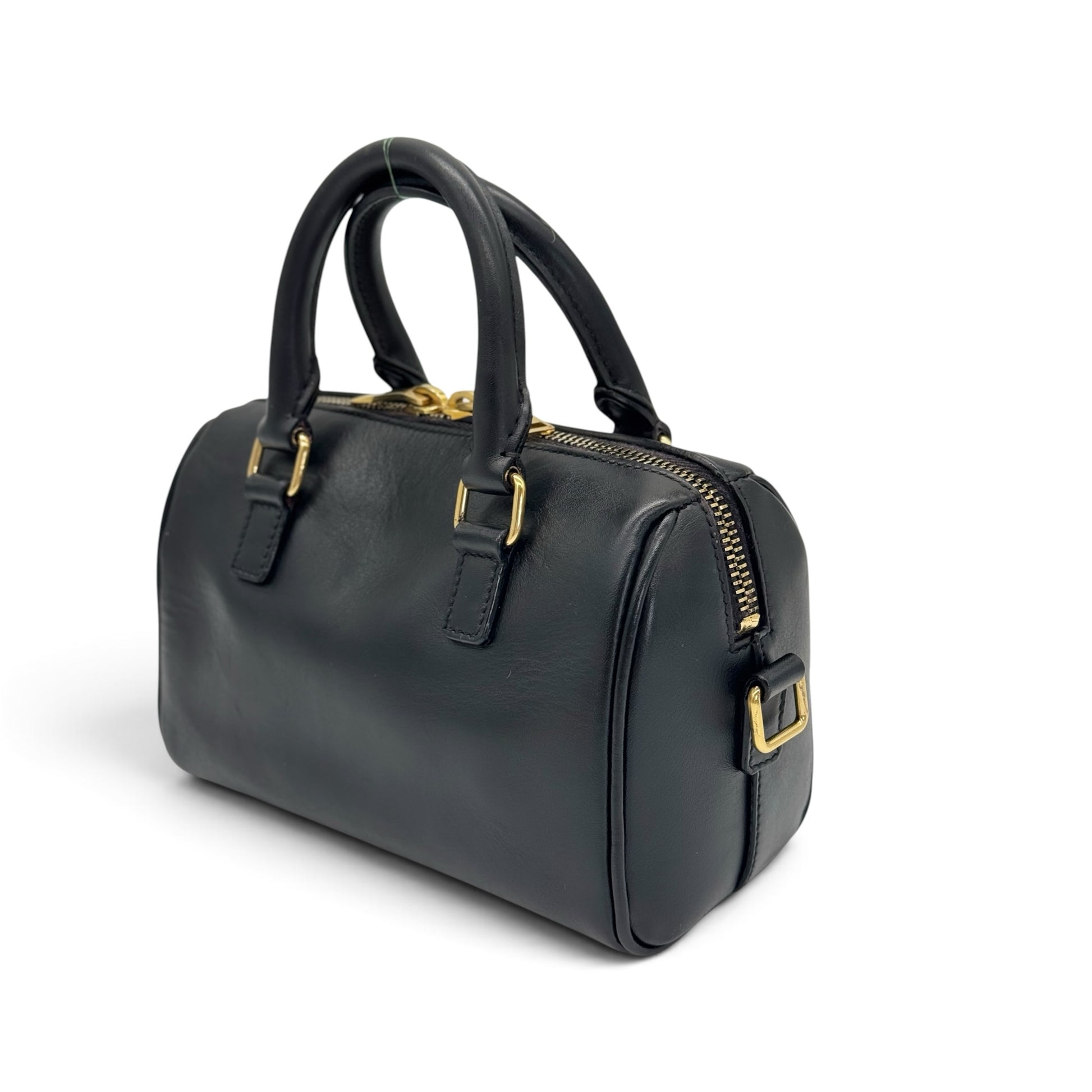 Borsa a mano Borse Vintage Saint Laurent in pelle nera con dettagli metallici dorati e design bowling strutturato