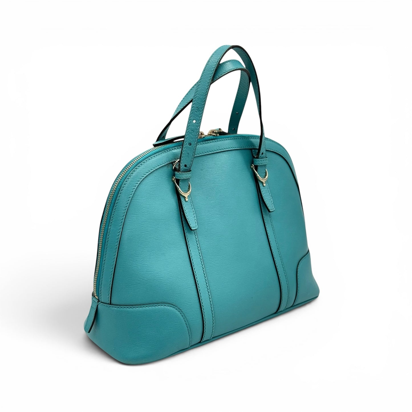 Borsa a mano Borse Vintage in pelle testurizzata turchese con silhouette a cupola e dettagli metallici dorati
