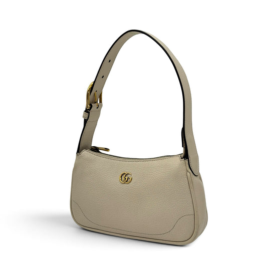 Borsa a spalla Borse Vintage Gucci Ophidia in pelle martellata avorio con logo GG dorato e tracolla regolabile
