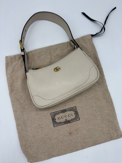 Borsa a spalla Borse Vintage Gucci Ophidia in pelle martellata avorio con logo GG dorato e tracolla regolabile