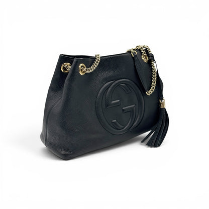 Borsa a spalla Borse Vintage Gucci in pelle nera martellata con logo impresso, nappa decorativa e tracolla a catena oro