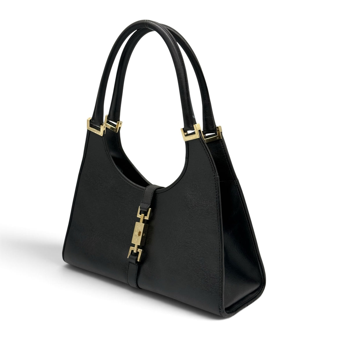 Borsa a spalla Borse Vintage Gucci in pelle nera con chiusura e dettagli in metallo dorato, design strutturato.