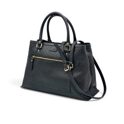 Borsa tote Borse Vintage Gucci in pelle nera con motivo GG impresso, dettagli in metallo dorato e tracolla rimovibile