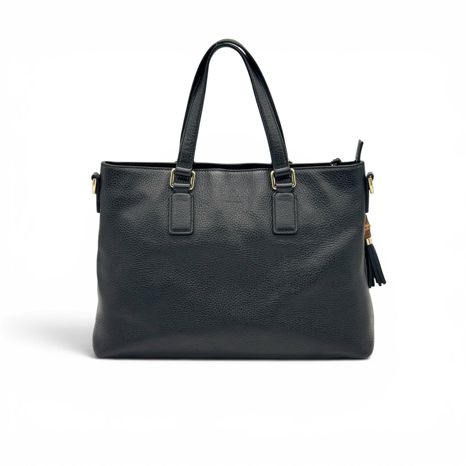Borsa tote Borse Vintage Gucci in pelle nera martellata con dettagli dorati e ciondolo con nappe e bambù