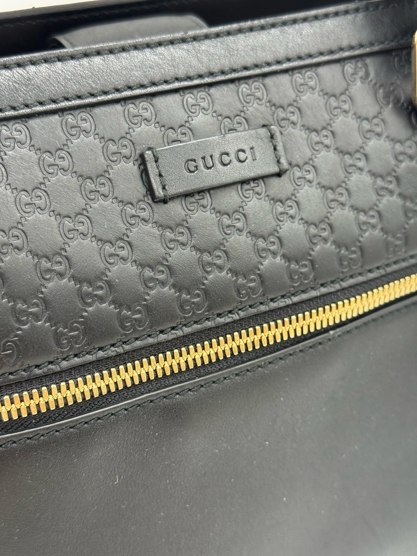 Borsa tote Borse Vintage Gucci in pelle nera con motivo GG impresso e dettaglio zip frontale in metallo dorato
