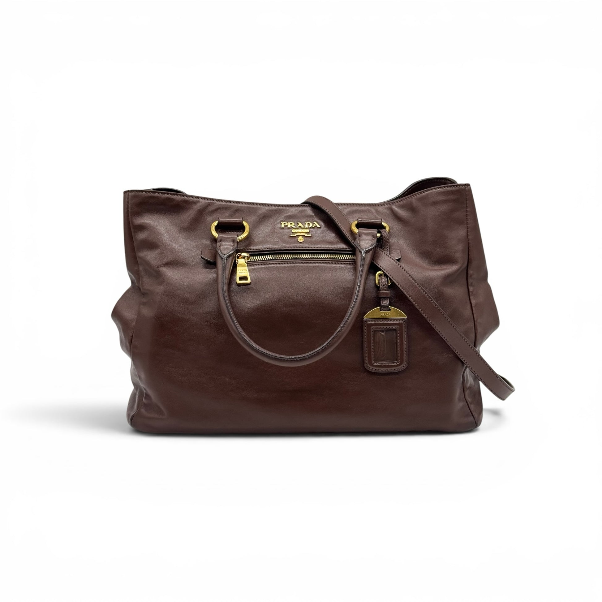 Borsa tote Borse Vintage Prada in pelle marrone con dettagli in metallo dorato, tasca frontale e tracolla rimovibile.