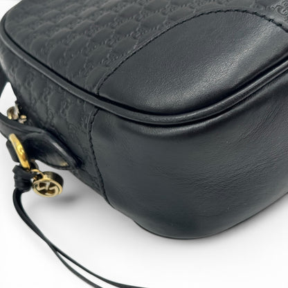 Borsa a tracolla Borse Vintage Gucci in pelle nera con motivo GG impresso e dettagli in metallo dorato