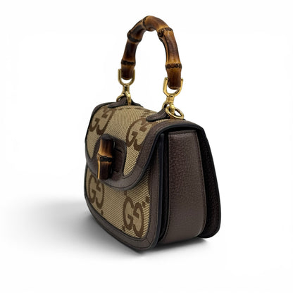 Borsa a tracolla Borse Vintage Gucci Bamboo in tela GG beige e pelle marrone con iconico manico e chiusura in bambù