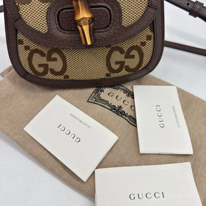 Borsa a tracolla Borse Vintage Gucci Bamboo in tela GG e pelle marrone con iconica chiusura e manico in bambù