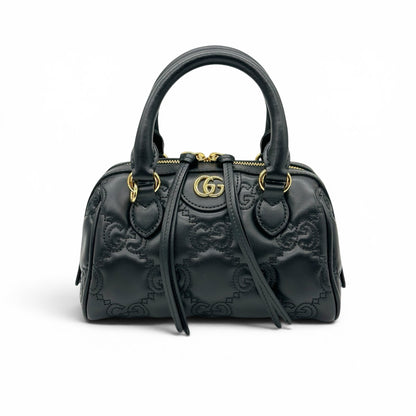 Borsa a mano Borse Vintage Gucci GG Matelassé in pelle nera con logo dorato e lavorazione trapuntata geometrica
