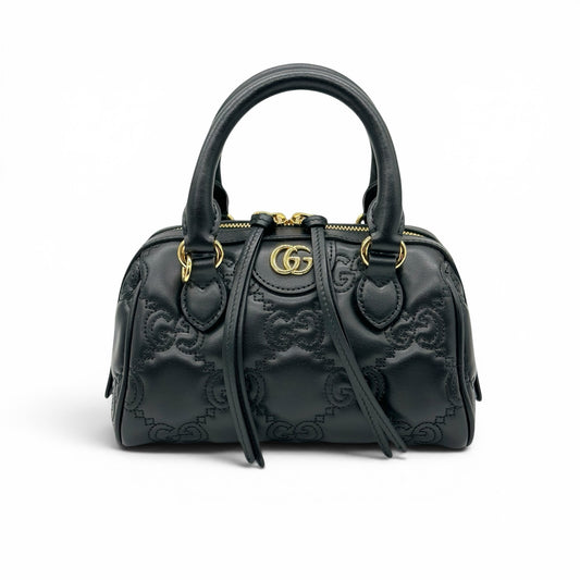 Borsa a mano Borse Vintage Gucci GG Matelassé in pelle nera con logo dorato e lavorazione trapuntata geometrica