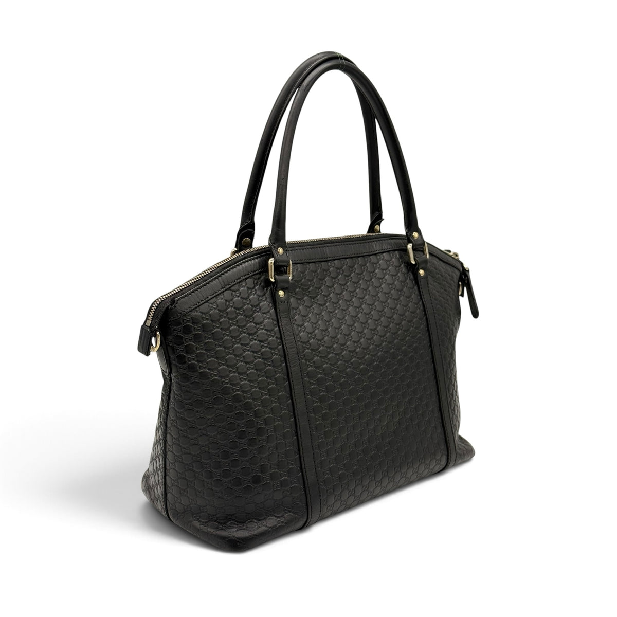 Borsa a spalla Borse Vintage Gucci in pelle nera con motivo GG impresso, manici e dettagli in metallo dorato.