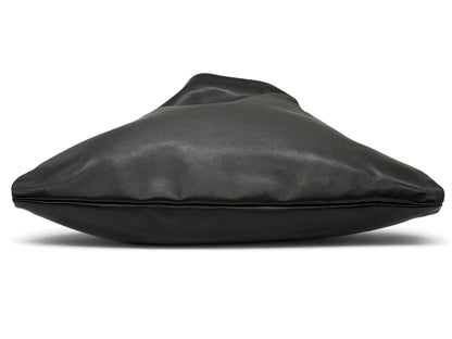 Borsa a spalla Borse Vintage Gucci in morbida pelle nera vista di profilo con silhouette hobo fluida