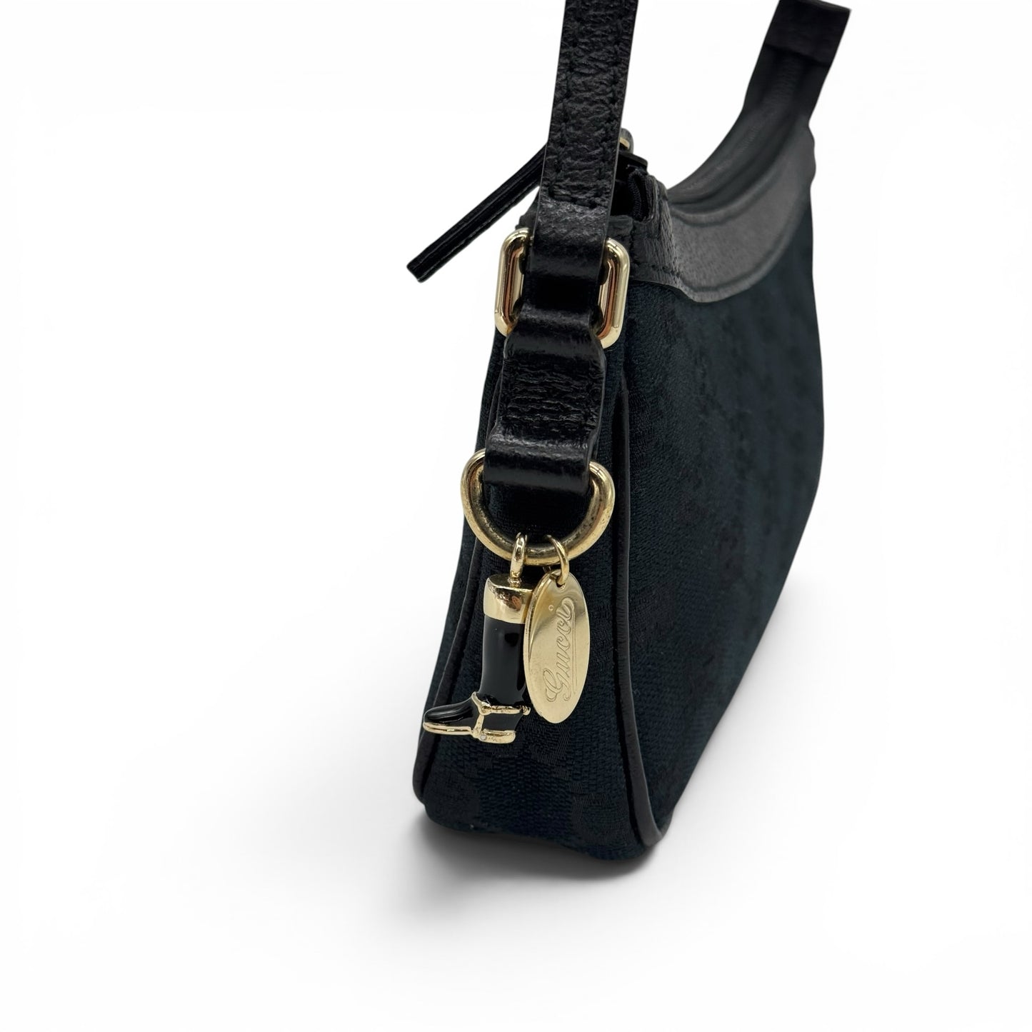 Borsa a spalla Borse Vintage Gucci in tessuto nero con monogramma, dettagli in pelle e ciondolo metallico dorato.