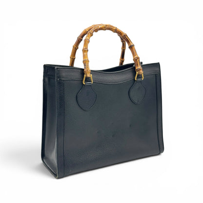 Borsa tote Borse Vintage Gucci in pelle nera granulata con iconici manici in bambù e dettagli in metallo dorato