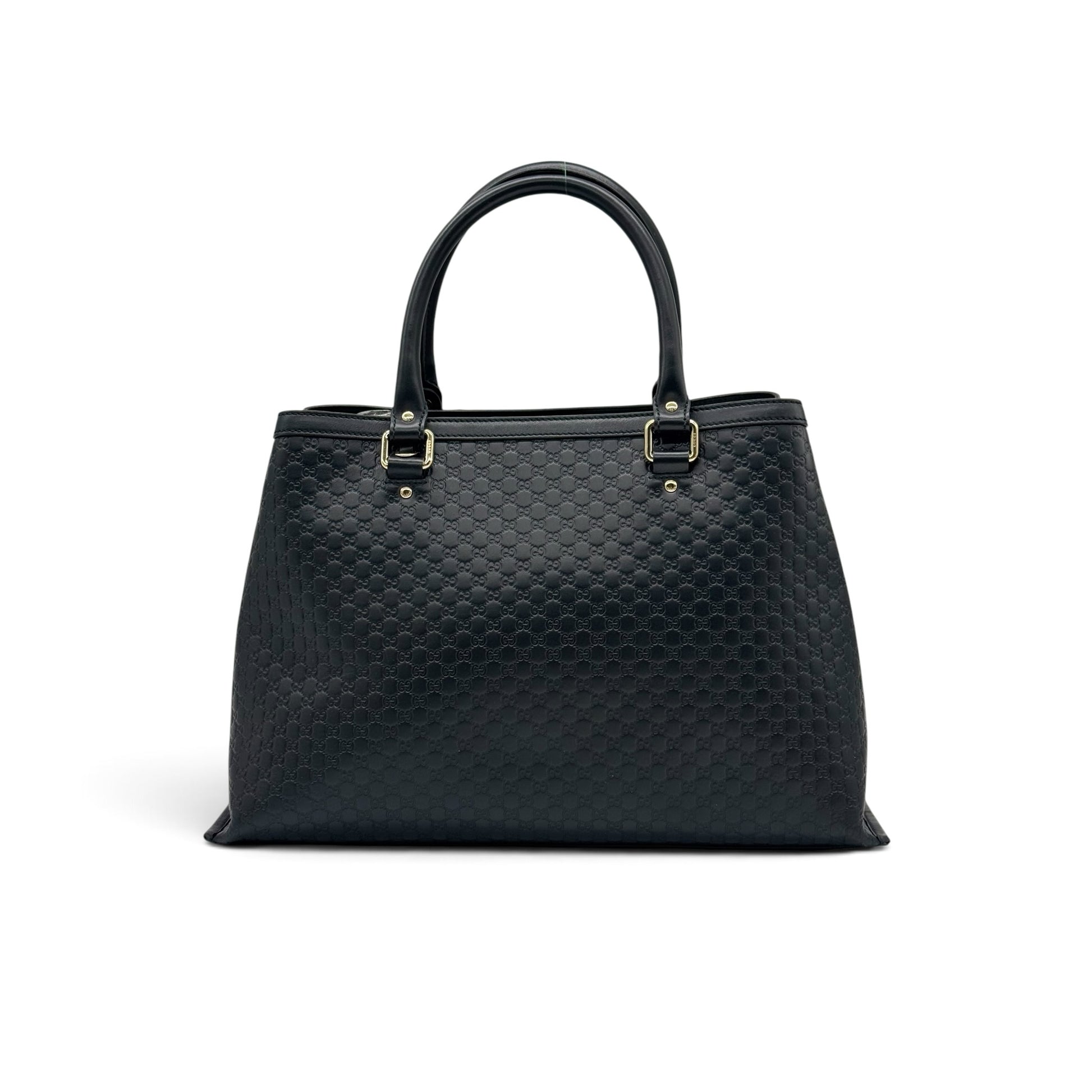 Borsa tote Borse Vintage Gucci in pelle nera con motivo GG impresso e dettagli in metallo dorato