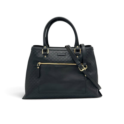 Borsa tote Borse Vintage Gucci in pelle nera con motivo GG impresso, dettagli in metallo dorato e tracolla rimovibile