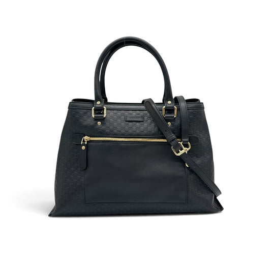 Borsa tote Borse Vintage Gucci in pelle nera con motivo GG impresso, dettagli in metallo dorato e tracolla rimovibile