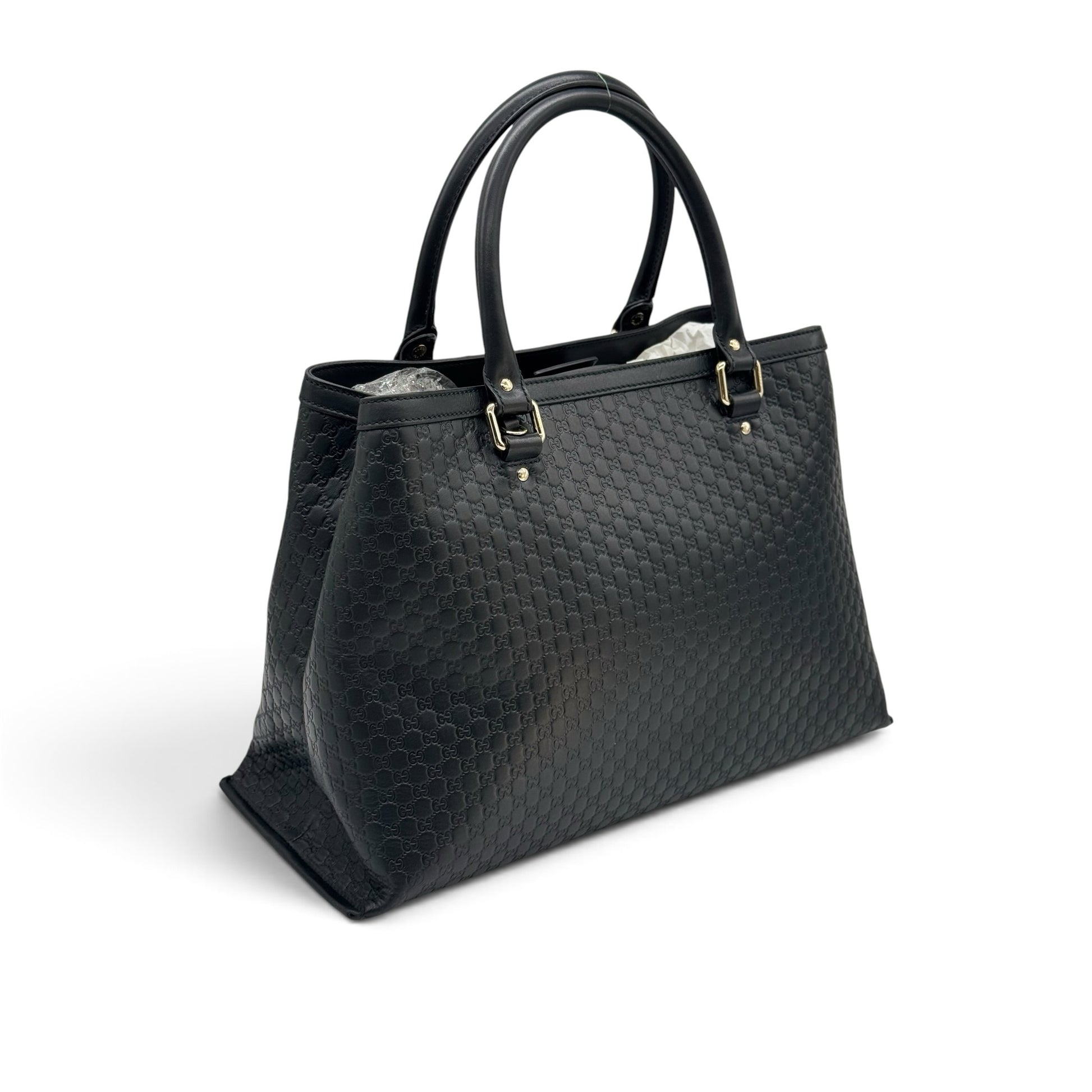 Borsa tote Borse Vintage Gucci in pelle nera con motivo GG impresso e dettagli in metallo dorato