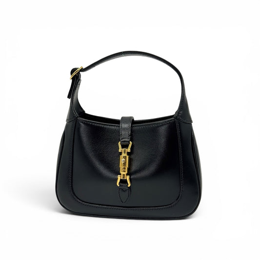 Borsa a spalla Borse Vintage Gucci Jackie 1961 in pelle nera liscia con iconica chiusura a pistone in metallo dorato