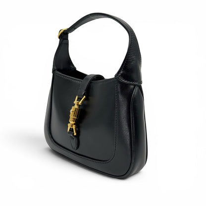 Borsa a spalla Borse Vintage Gucci Jackie 1961 in pelle nera liscia con iconica chiusura a pistone in metallo dorato