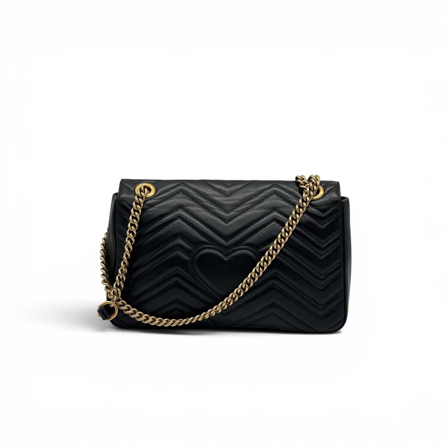 Borsa a tracolla Borse Vintage Gucci Marmont in pelle nera matelassé con motivo chevron, cuore sul retro e catena dorata.