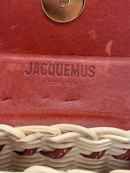 Dettaglio interno della borsa Borse Vintage Jacquemus in pelle color cuoio con logo impresso e intreccio in vimini