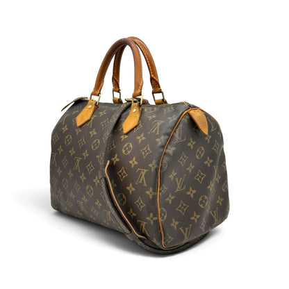 Borsa Borse Vintage Louis Vuitton Speedy in tela Monogram con manici in pelle e tracolla, vista laterale.