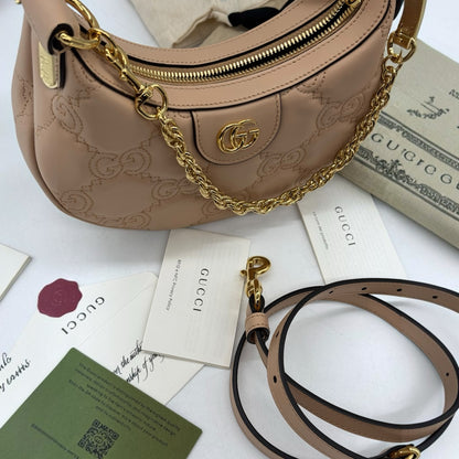 Mini borsa a spalla Borse Vintage Gucci GG Matelassé in pelle beige con catena dorata e tracolla rimovibile