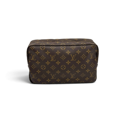 Pochette Louis Vuitton vintage in tela Monogram marrone con iconico motivo floreale e chiusura a zip Borse Vintage