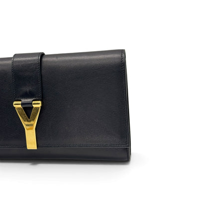 Pochette Borse Vintage Yves Saint Laurent in pelle nera con logo metallico dorato a forma di Y