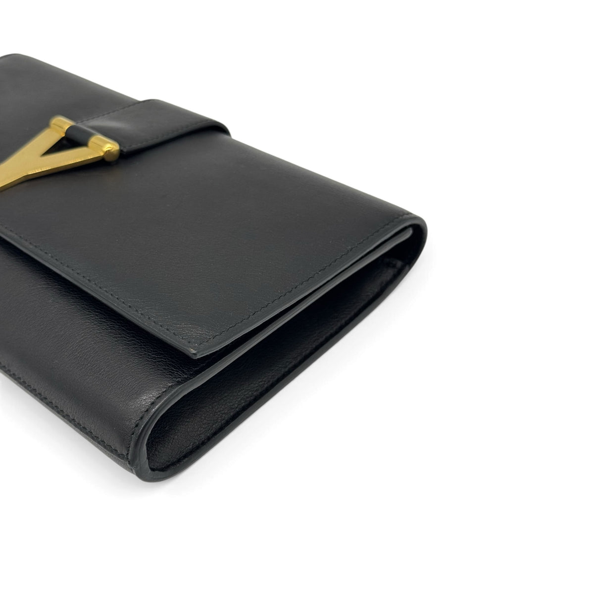 Pochette Borse Vintage Yves Saint Laurent in pelle nera con logo metallico dorato a forma di Y