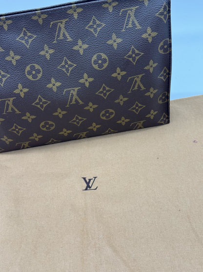 Pochette Toilette Louis Vuitton in tela Monogram marrone proposta da Borse Vintage su sacchetto protettivo beige