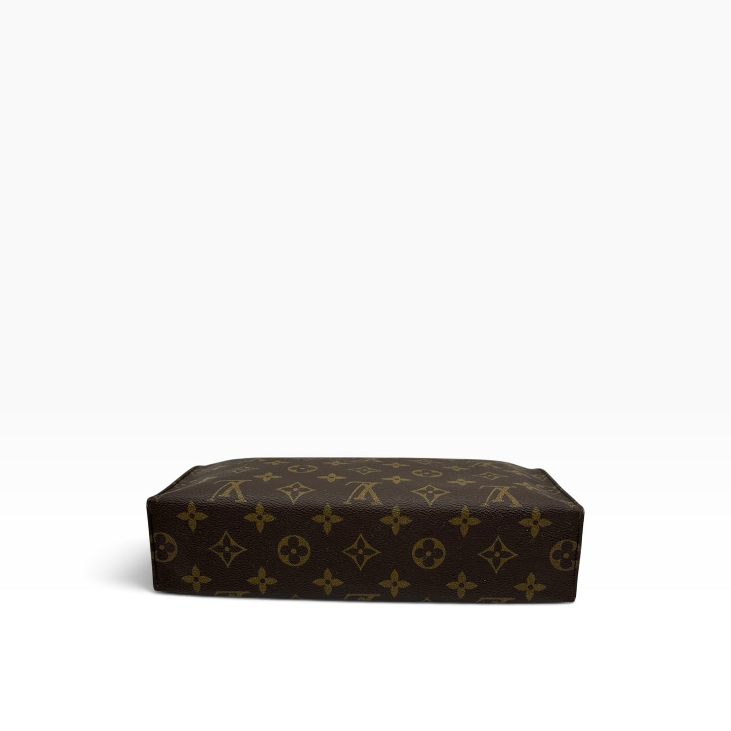 Pochette Toilette Louis Vuitton in tela Monogram marrone di Borse Vintage, vista di profilo della base strutturata.