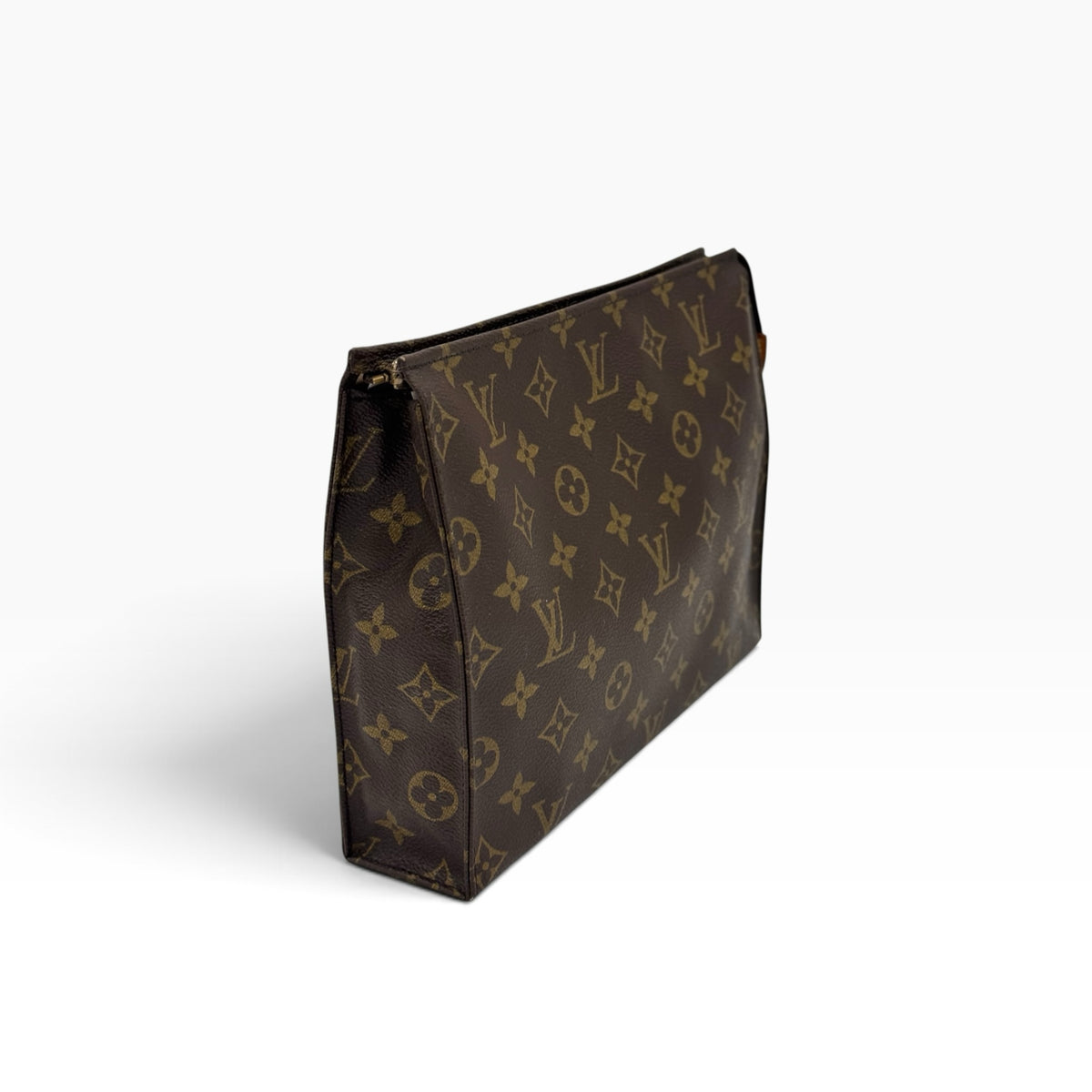Pochette Toilette Louis Vuitton in tela Monogram marrone, accessorio di lusso firmato Borse Vintage.