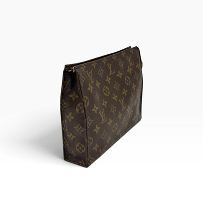Pochette Toilette Louis Vuitton in tela Monogram marrone, accessorio di lusso firmato Borse Vintage.