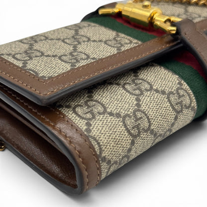 Portafoglio a tracolla Borse Vintage Gucci Jackie in tela GG Supreme con nastro Web, finiture in pelle e chiusura oro