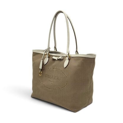 Borsa tote Borse Vintage Prada in tessuto kaki con profili in pelle bianca, logo ricamato e dettagli dorati.
